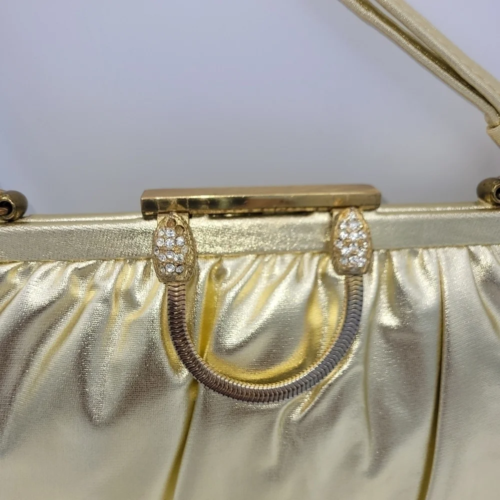 Vintage Andé Gold Clutch With Rhinestone Details Clasp.